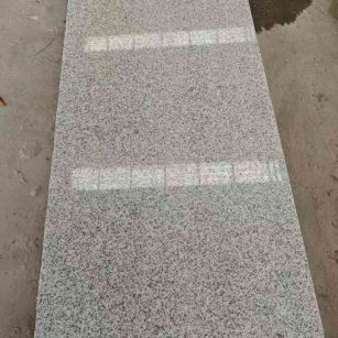 淮安芝麻白光面毛板